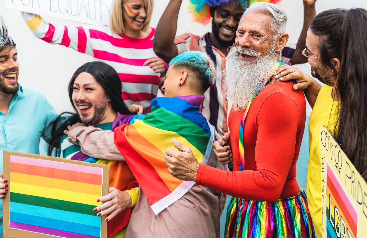 Image shows a group of people celerbrating pride